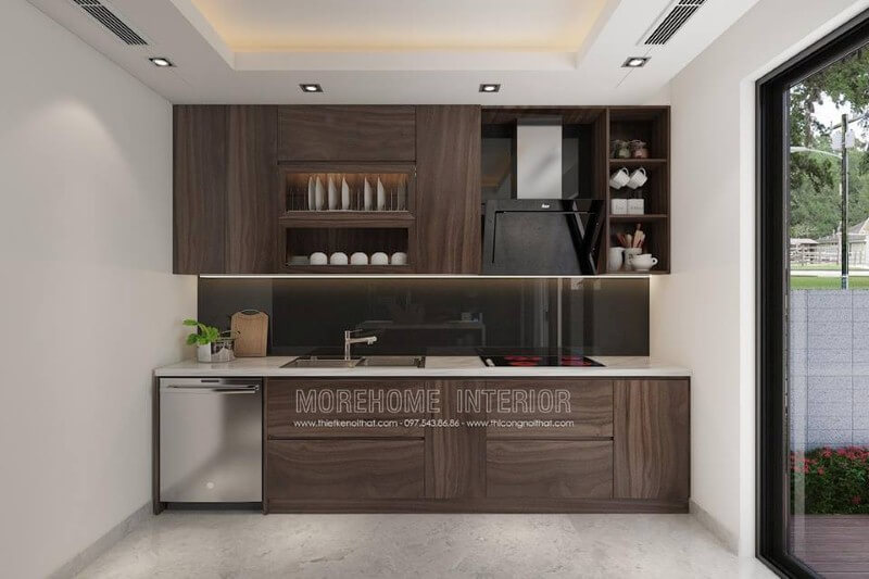 Mẫu tủ bếp với đường vân độc đáo cùng gỗ tối màu đã tạo nên không gian bếp hiện đại sang trọng. Thiết kế tủ bếp chung cư